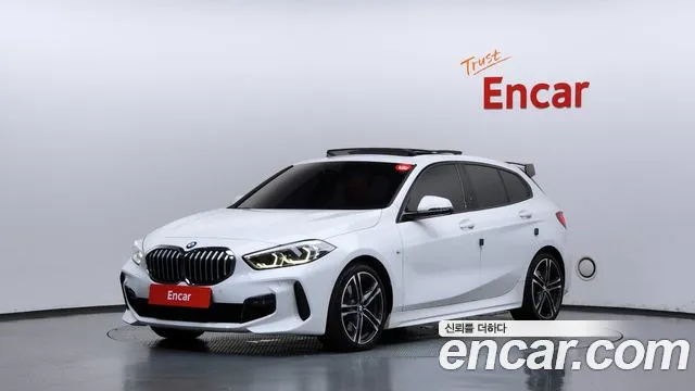 BMW 1-Series 2021 — photo 1