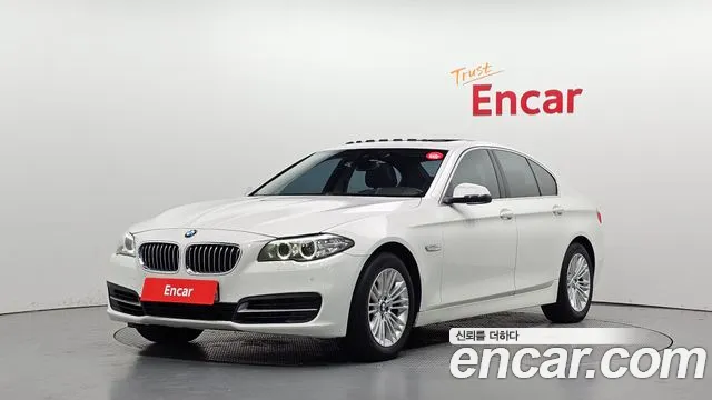 BMW 5-Series 2014 — photo 1