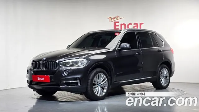 BMW X5 2014 — photo 1