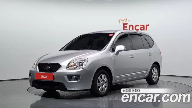 Kia Carens 2011 — photo 1
