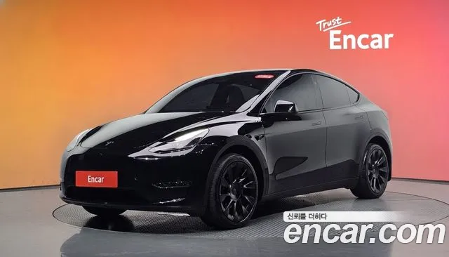 Tesla Model Y 2024 — photo 1