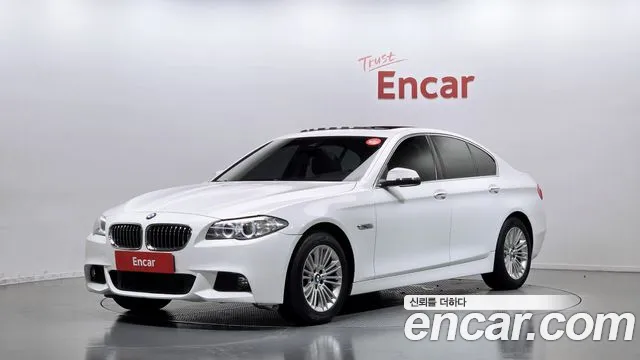 BMW 5-Series 2014 — photo 1
