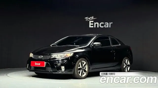 Kia Porte 2012 — photo 1