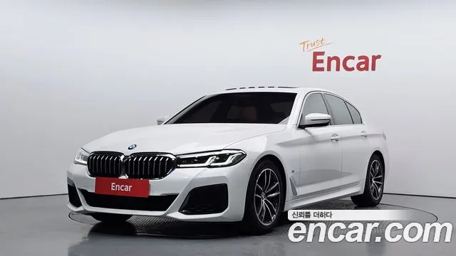 BMW 5-Series 2021 — photo 1