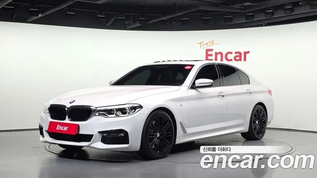 BMW 5-Series 2018 — photo 1