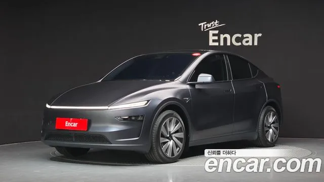 Tesla Model Y 2025 — photo 1