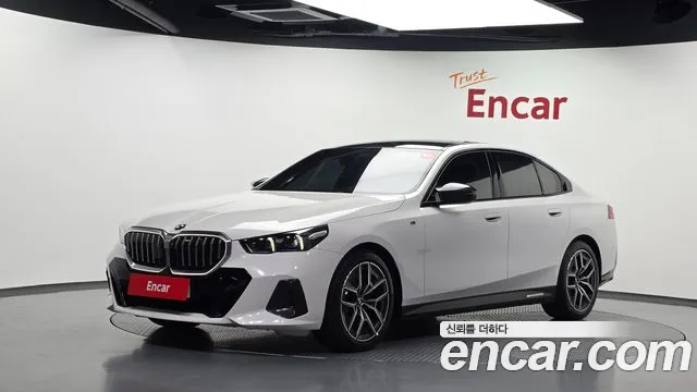 BMW 5-Series 2024 — photo 1