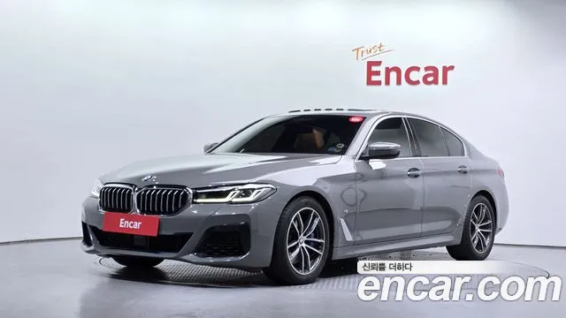 BMW 5-Series 2022 — photo 1