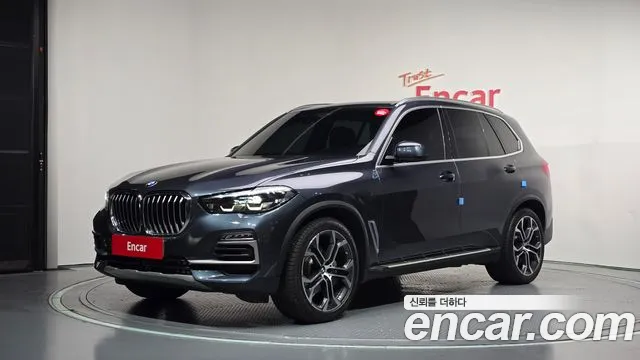 BMW X5 2021 — photo 1