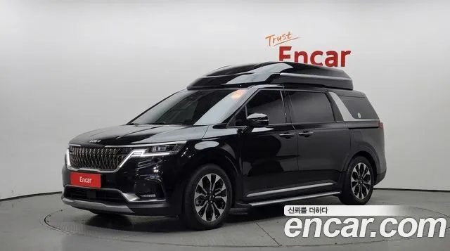 Kia Canival 2023 — photo 1