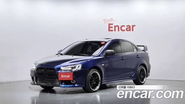Mitsubishi Lancer 2010 — photo 1
