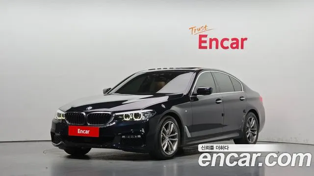 BMW 5-Series 2018 — photo 1