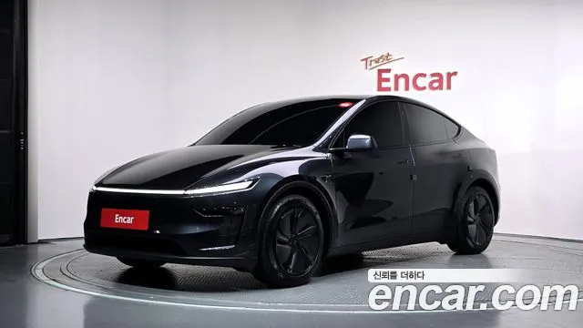 Tesla Model Y 2025 — photo 1