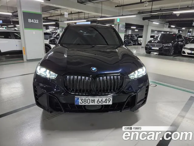 BMW X5 2024 — photo 1