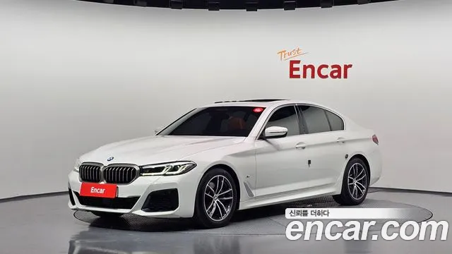 BMW 5-Series 2023 — photo 1