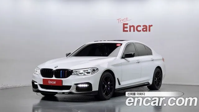 BMW 5-Series 2018 — photo 1
