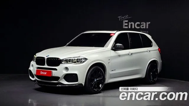 BMW X5 2015 — photo 1