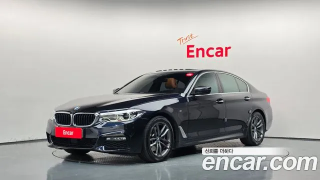 BMW 5-Series 2018 — photo 1