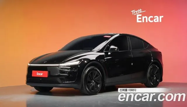 Tesla Model Y 2025 — photo 1