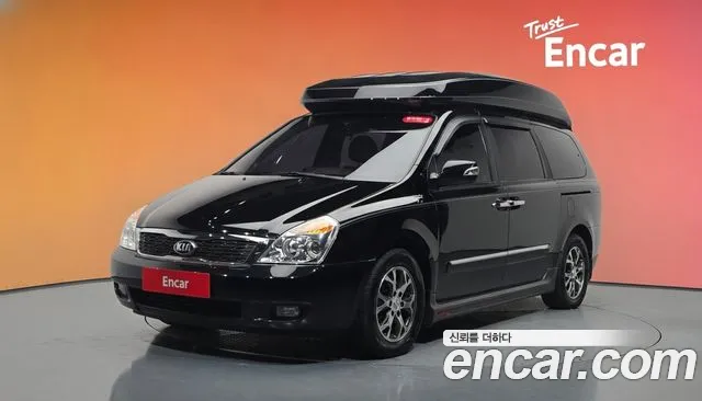 Kia Canival 2014 — photo 1