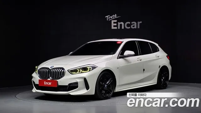 BMW 1-Series 2021 — photo 1