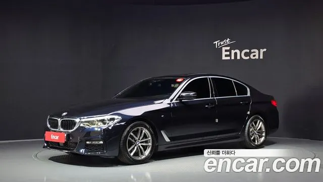 BMW 5-Series 2018 — photo 1