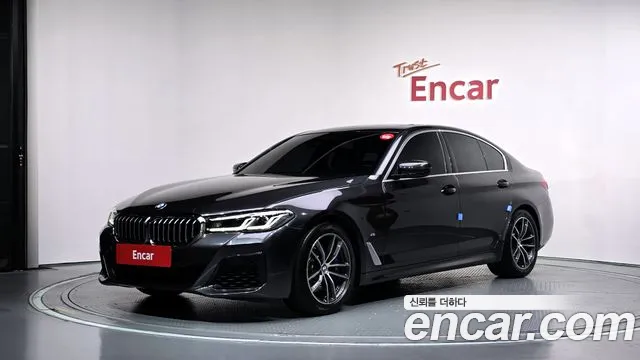BMW 5-Series 2022 — photo 1