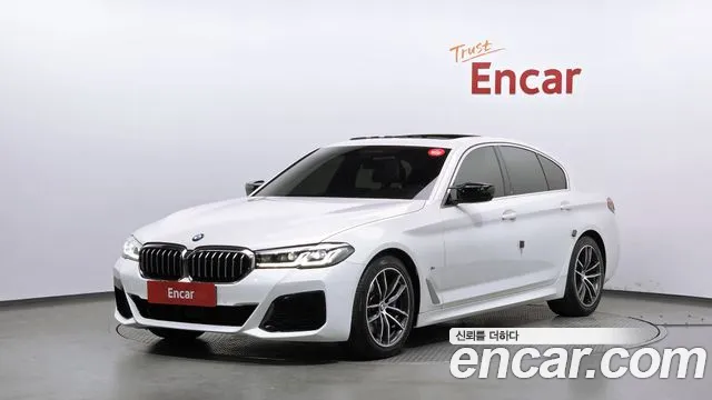 BMW 5-Series 2023 — photo 1