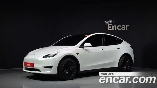 Tesla Model Y 2024 — photo 1