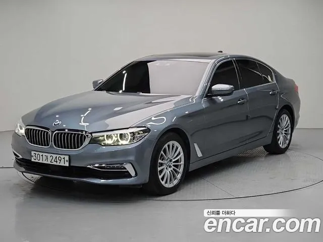 BMW 5-Series 2019 — photo 1