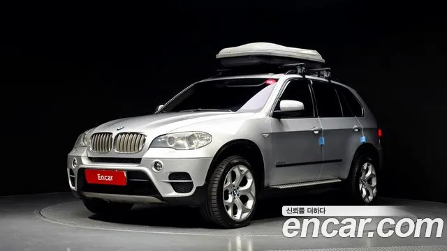 BMW X5 2011 — photo 1
