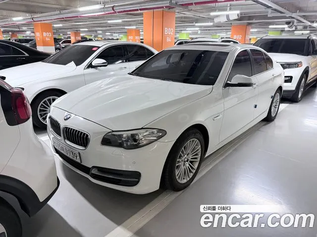 BMW 5-Series 2015 — photo 1