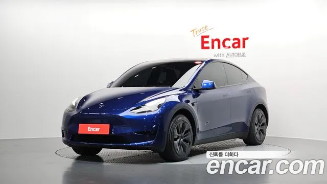 Tesla Model Y 2025 — photo 1