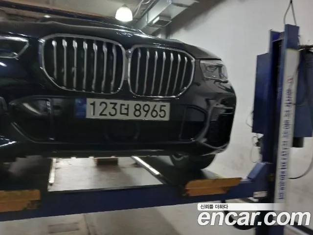 BMW X5 2022 — photo 1