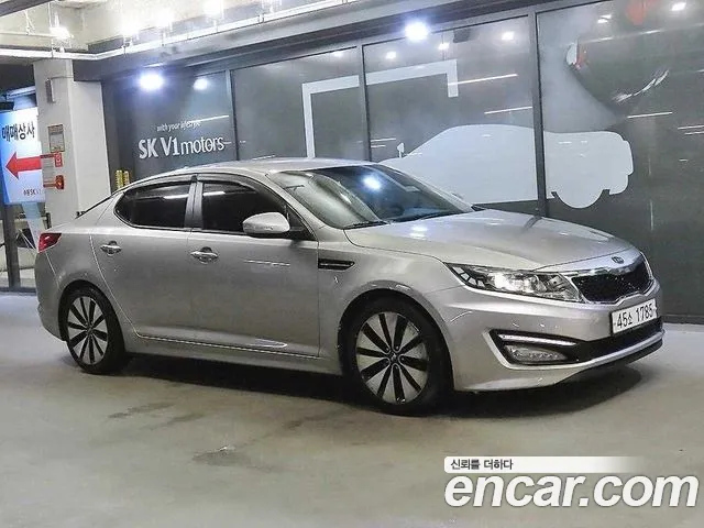 Kia K5 2012 — photo 1