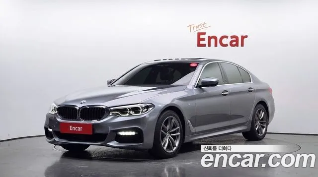 BMW 5-Series 2018 — photo 1