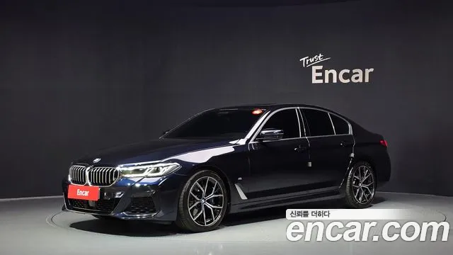 BMW 5-Series 2023 — photo 1