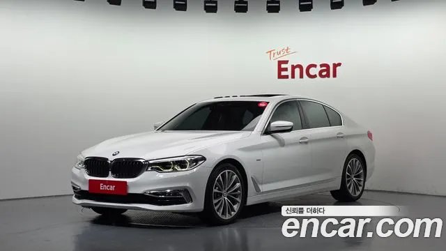BMW 5-Series 2018 — photo 1