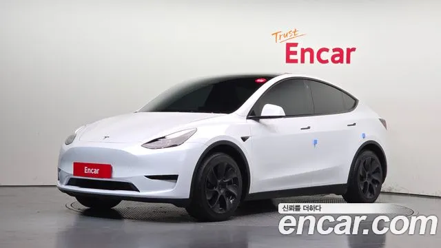 Tesla Model Y 2023 — photo 1