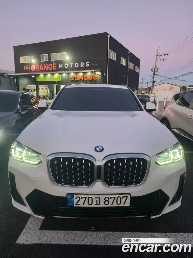 BMW X4 2022 — photo 1