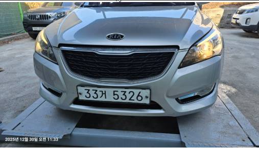 Kia K7 2012 — inspection photo 1