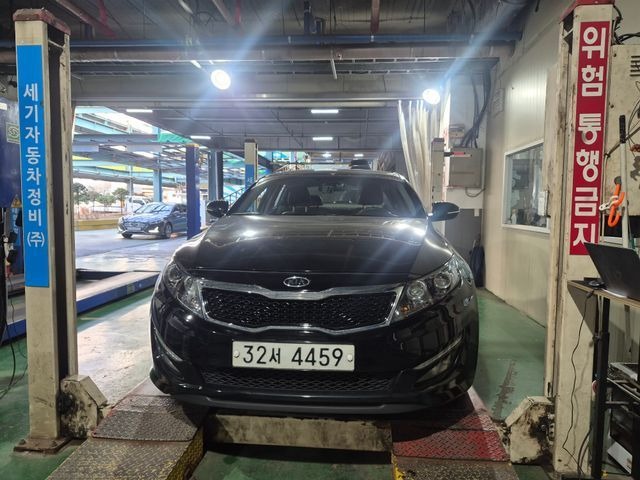 Kia K5 2011 — inspection photo 1