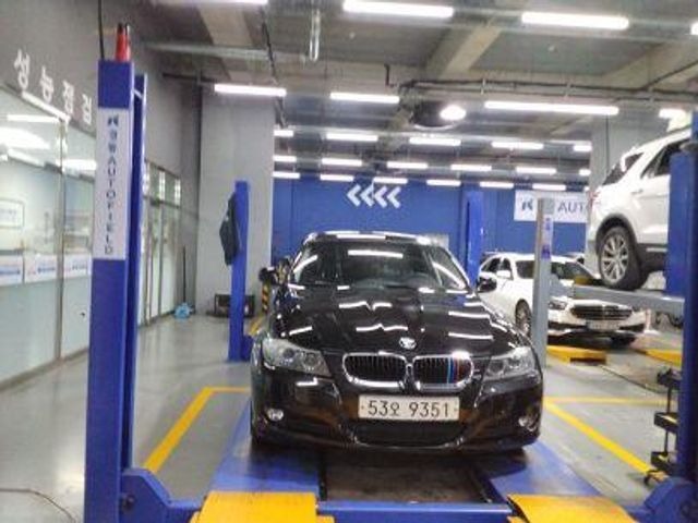 BMW 3-Series 2010 — inspection photo 1