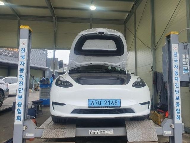 Tesla Model Y 2024 — inspection photo 1