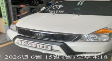 Kia Canival 2010 — inspection photo 1