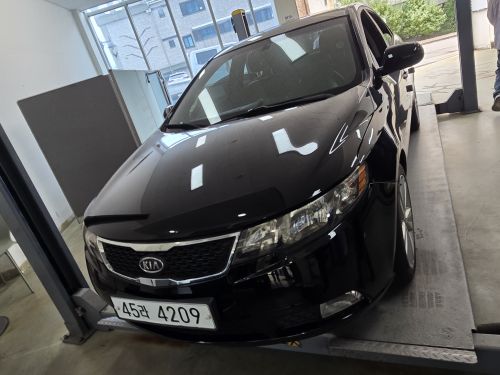 Kia Porte 2011 — inspection photo 1