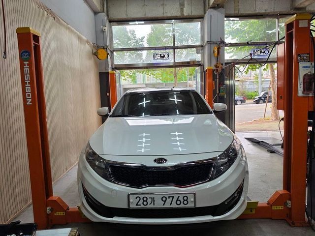 Kia K5 2011 — inspection photo 1