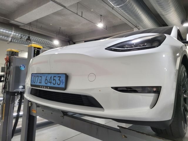 Tesla Model Y 2024 — inspection photo 1