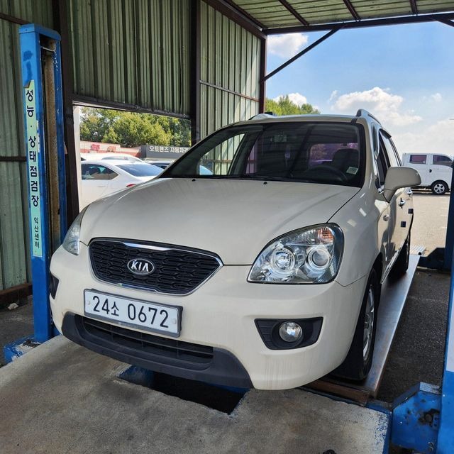 Kia Carens 2011 — inspection photo 1