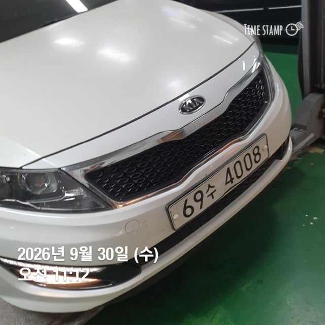 Kia K5 2011 — inspection photo 1